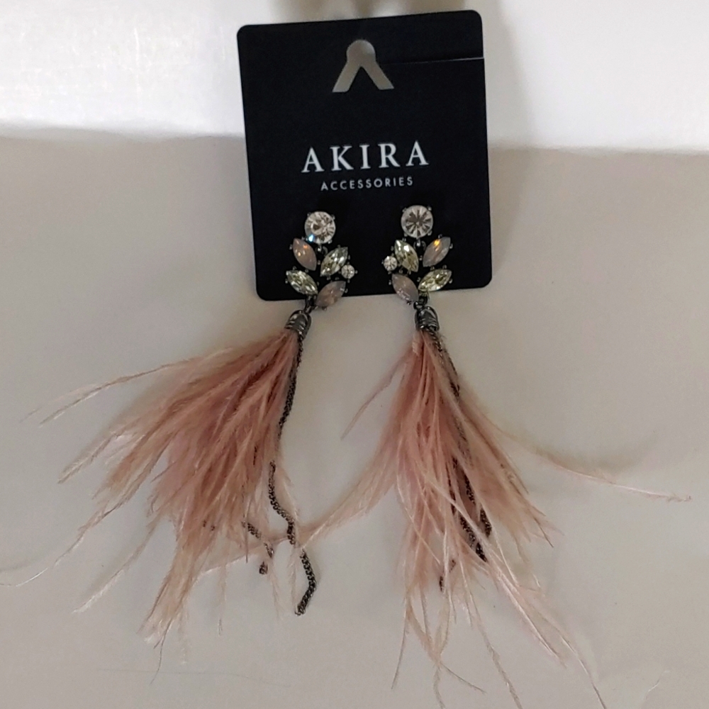 Akira rhinestone and feather statement earrings.